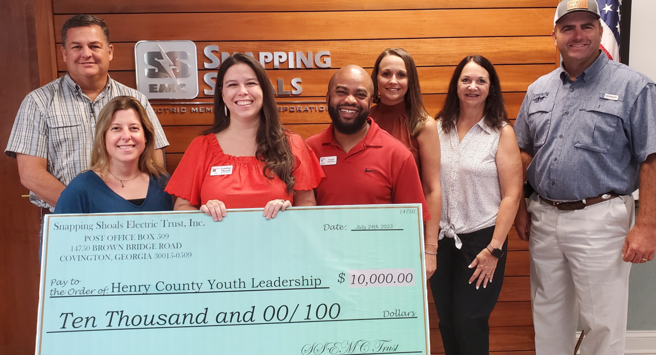 Operation round up donates to youth organization snapping shoals emc